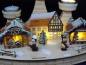 Preview: weihnachtsn´markt winterszene mit figuren und teelichhalter