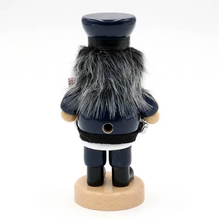 „Lustige Räuchermannfigur aus Holz in Polizistenuniform mit Pistole und Handschellen – bauchige Form, Rauchöffnung im Mund, ca. 16 cm hoch.“