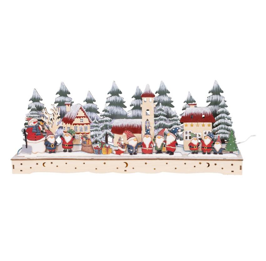 Verschneite Häuser mit Sternen und Tannenbäumen im Hintergrund – liebevoll bemalte Details des LED-Dioramas „Wichtelhausen“.