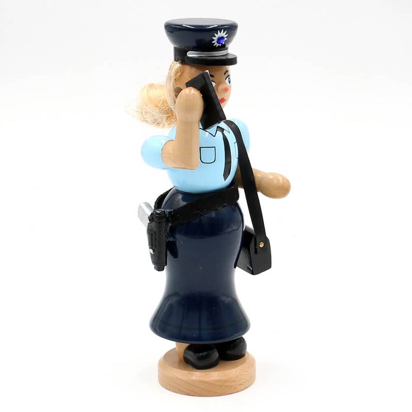Räucherfigur in Polizeiuniform mit zeitgemäßen Accessoires