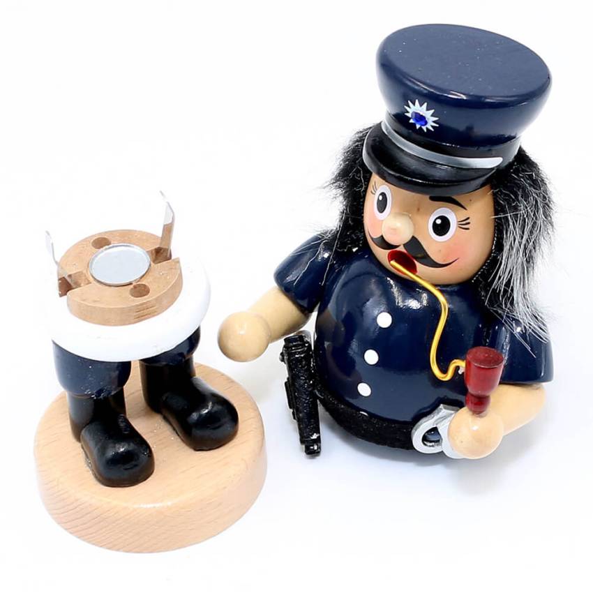 „Lustige Räuchermannfigur aus Holz in Polizistenuniform mit Pistole und Handschellen – bauchige Form, Rauchöffnung im Mund, ca. 16 cm hoch.“