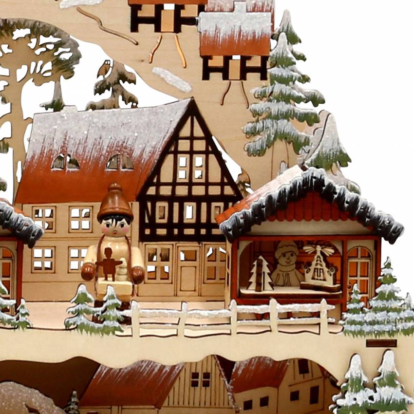detail rechts Schwibbogen mit Bank dekorativer filigraner Weihnachtsmarkt