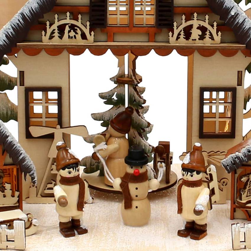 Weihnachtsdeko mit Schneemann, Kindern und beweglichem Karussell