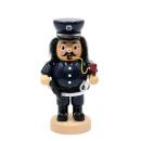 „Lustige Räuchermannfigur aus Holz in Polizistenuniform mit Pistole und Handschellen – bauchige Form, Rauchöffnung im Mund, ca. 16 cm hoch.“